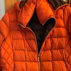Michael Kors Orange puffer Jacket
Used condition
Size 1x